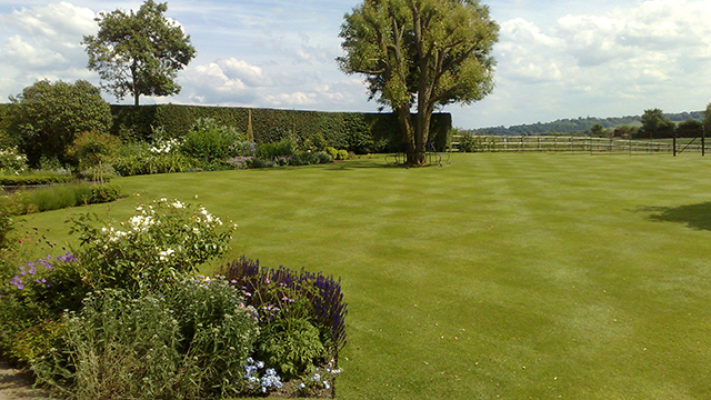 Image of mainained latge garden and borders